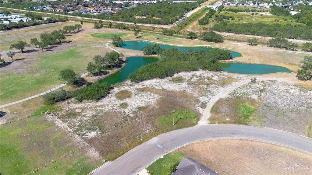 2400 Rhett Drive Pharr, TX 78577 - Photo 3 of 5 a view of a lake with a yard