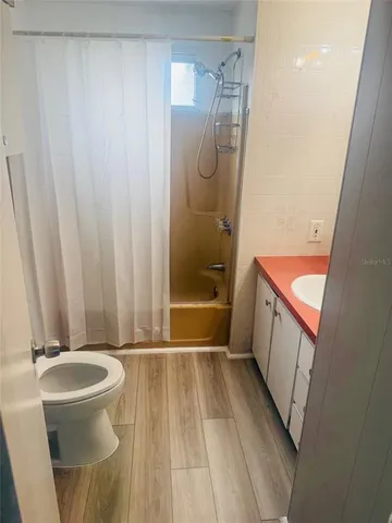 a bathroom with a sink and a shower