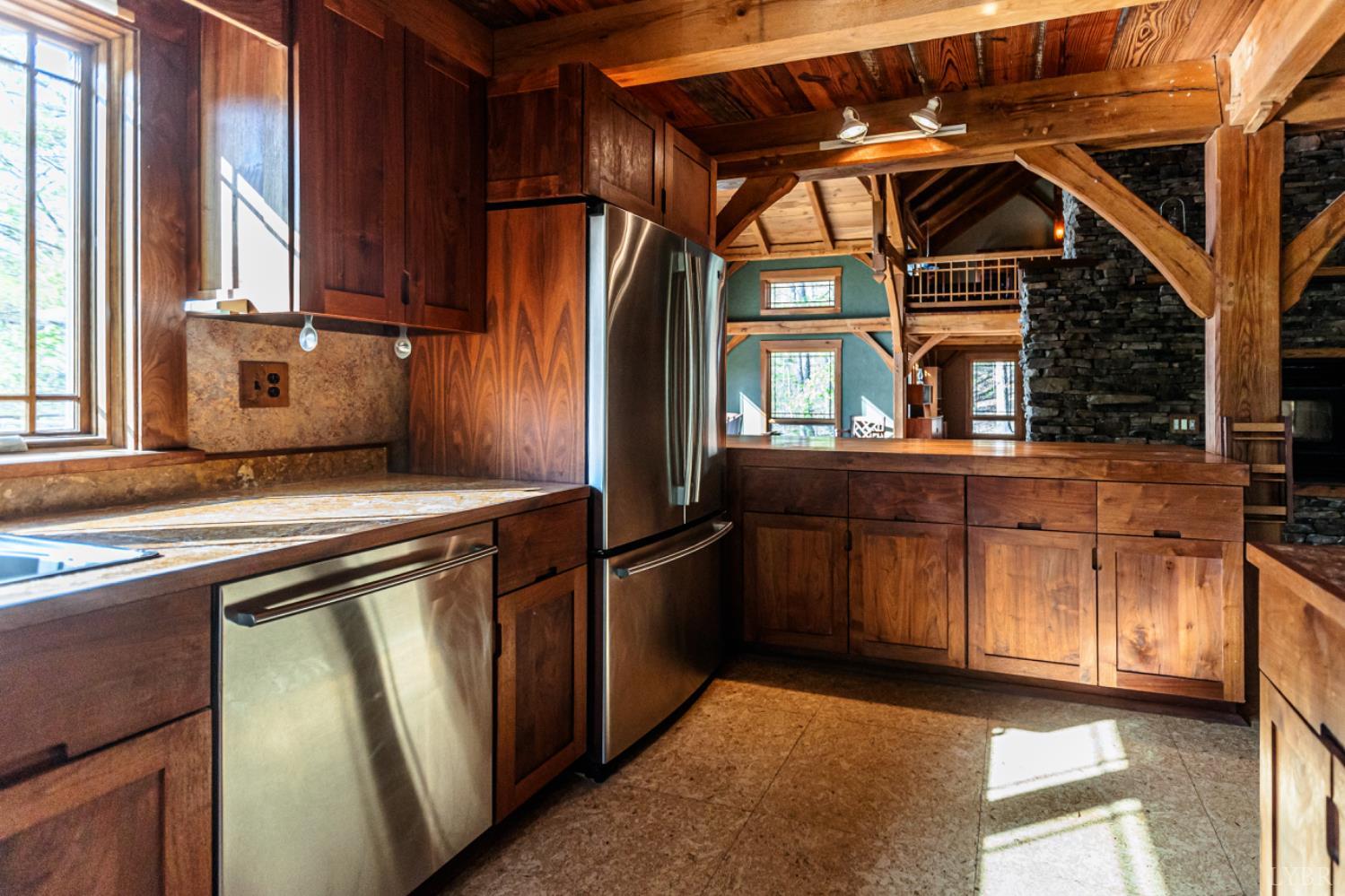 278 Salt Lick Lane Appomattox, VA 24522 - Photo 26 of 78 a kitchen with stainless steel appliances granite countertop a sink a stove and a refrigerator