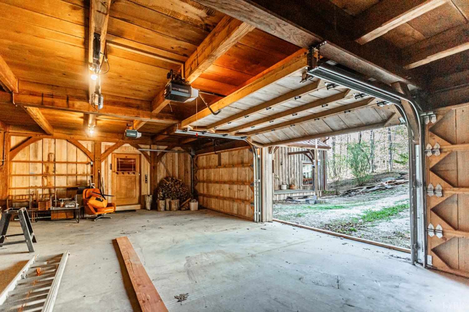 278 Salt Lick Lane Appomattox, VA 24522 - Photo 59 of 78 a view of a garage with wooden walls