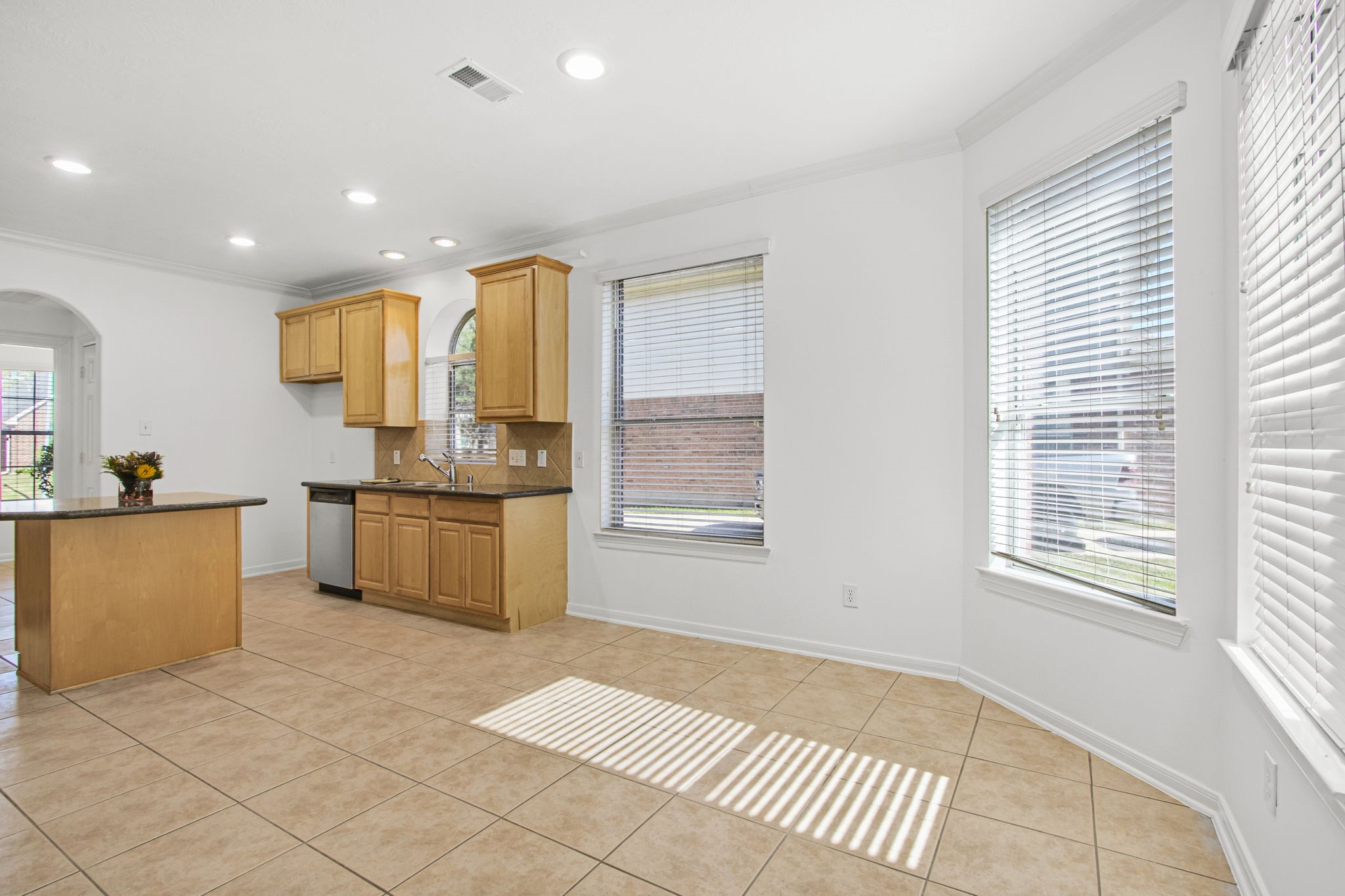 6731 Pinetop Glen Lane Spring, TX 77379 - Photo 21 of 47 a kitchen with a sink cabinets and window