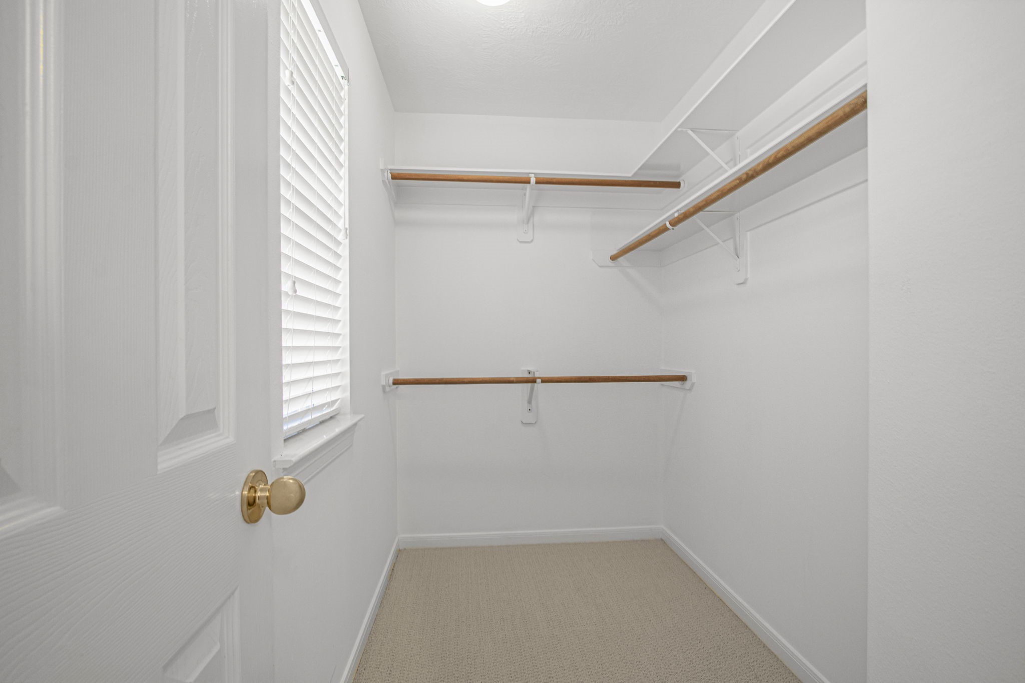 6731 Pinetop Glen Lane Spring, TX 77379 - Photo 34 of 47 a view of walk in closet with window