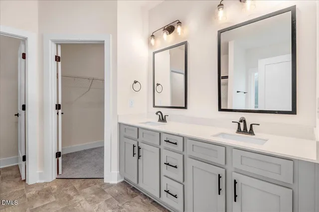 a view of empty room with ceiling fan