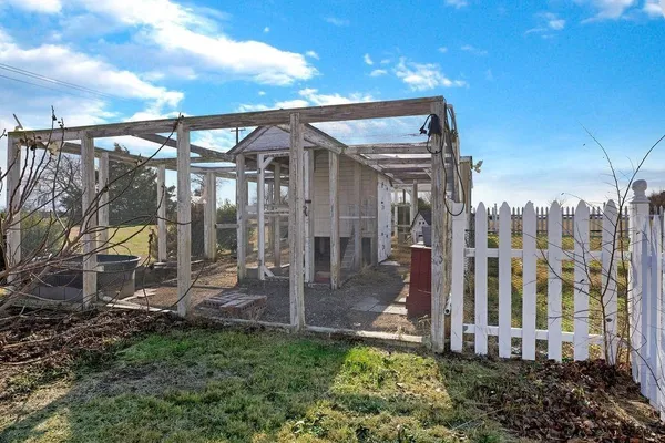 a view of living room kitchen