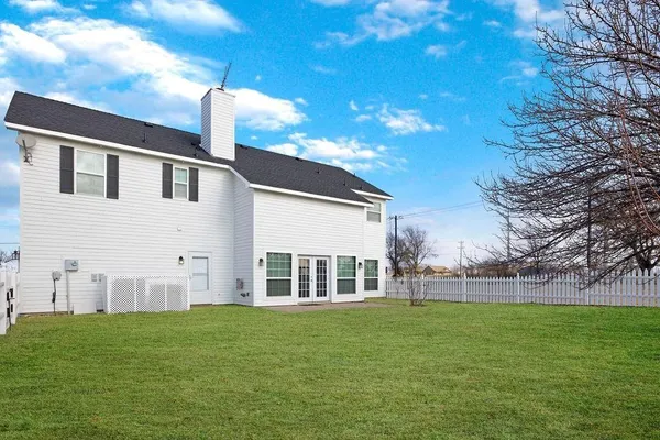 a view of a garden with a tree