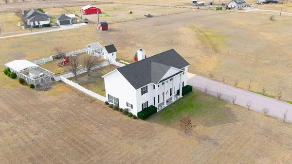 a view of residential houses with outdoor space