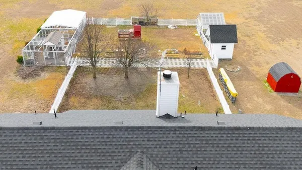a view of a balcony with chairs