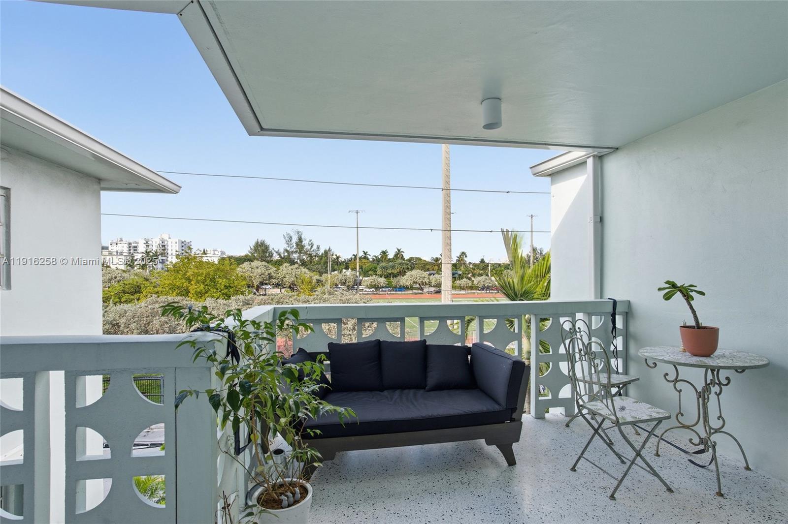 1100 11th Street, Unit 405 Miami Beach, FL 33139 - Photo 24 of 28 a outdoor living room with furniture