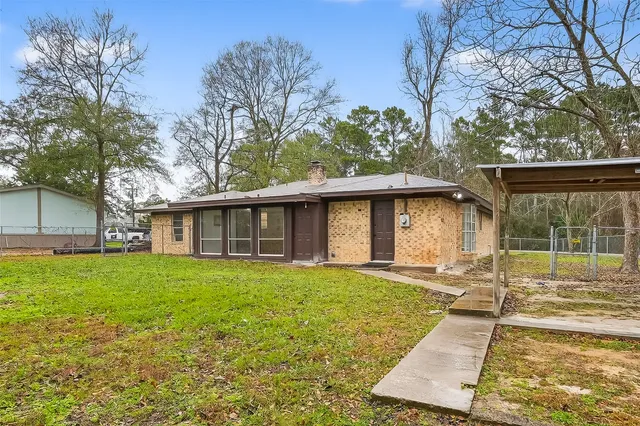 a kitchen with stainless steel appliances granite countertop a refrigerator stove a sink and dishwasher