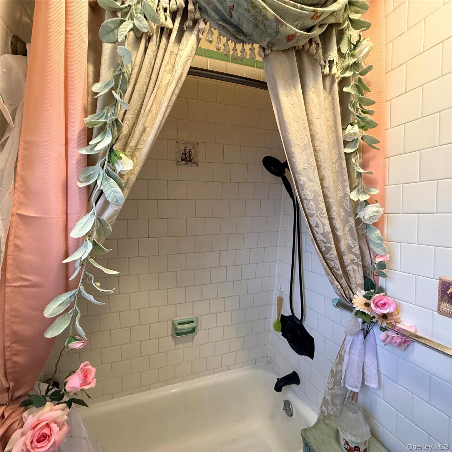 45 Maple Street Walden, NY 12586 - Photo 15 of 20 a bath tub sitting next to a white sink