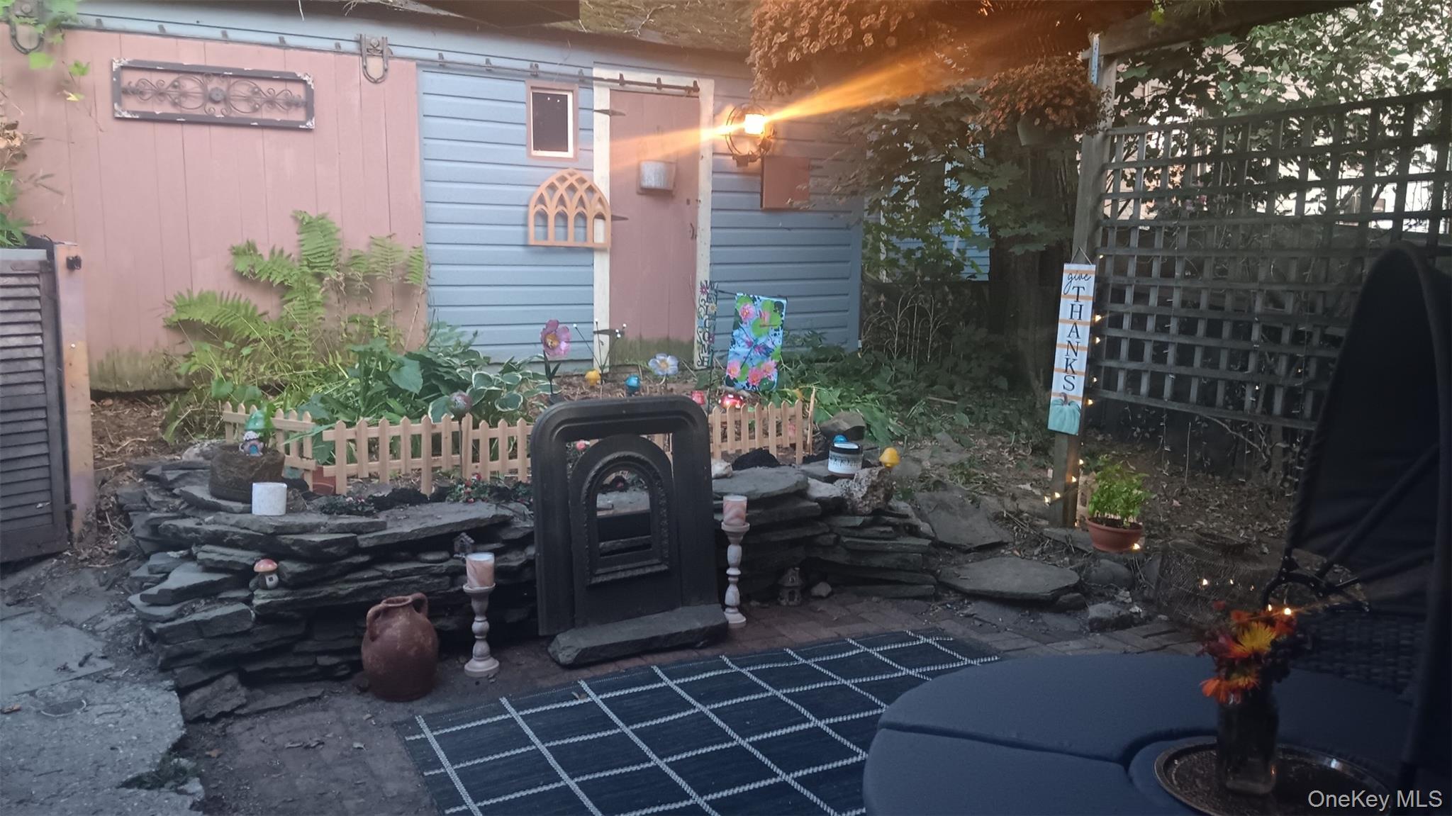 45 Maple Street Walden, NY 12586 - Photo 20 of 20 a view of a chairs and table in backyard