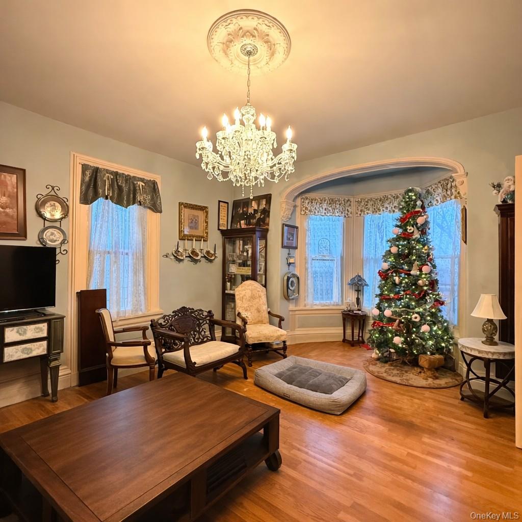 45 Maple Street Walden, NY 12586 - Photo 5 of 20 a living room with furniture and a chandelier