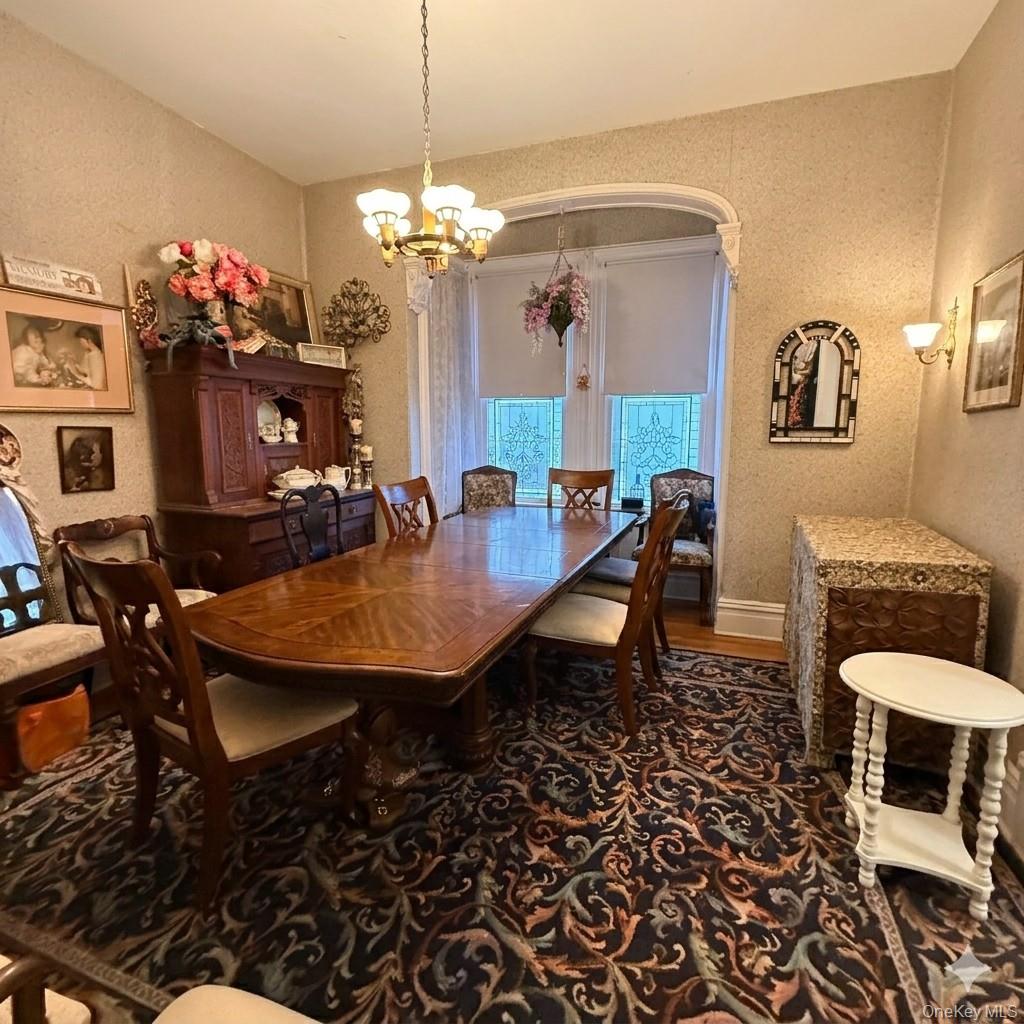 45 Maple Street Walden, NY 12586 - Photo 7 of 20 a dining room with furniture and chandelier