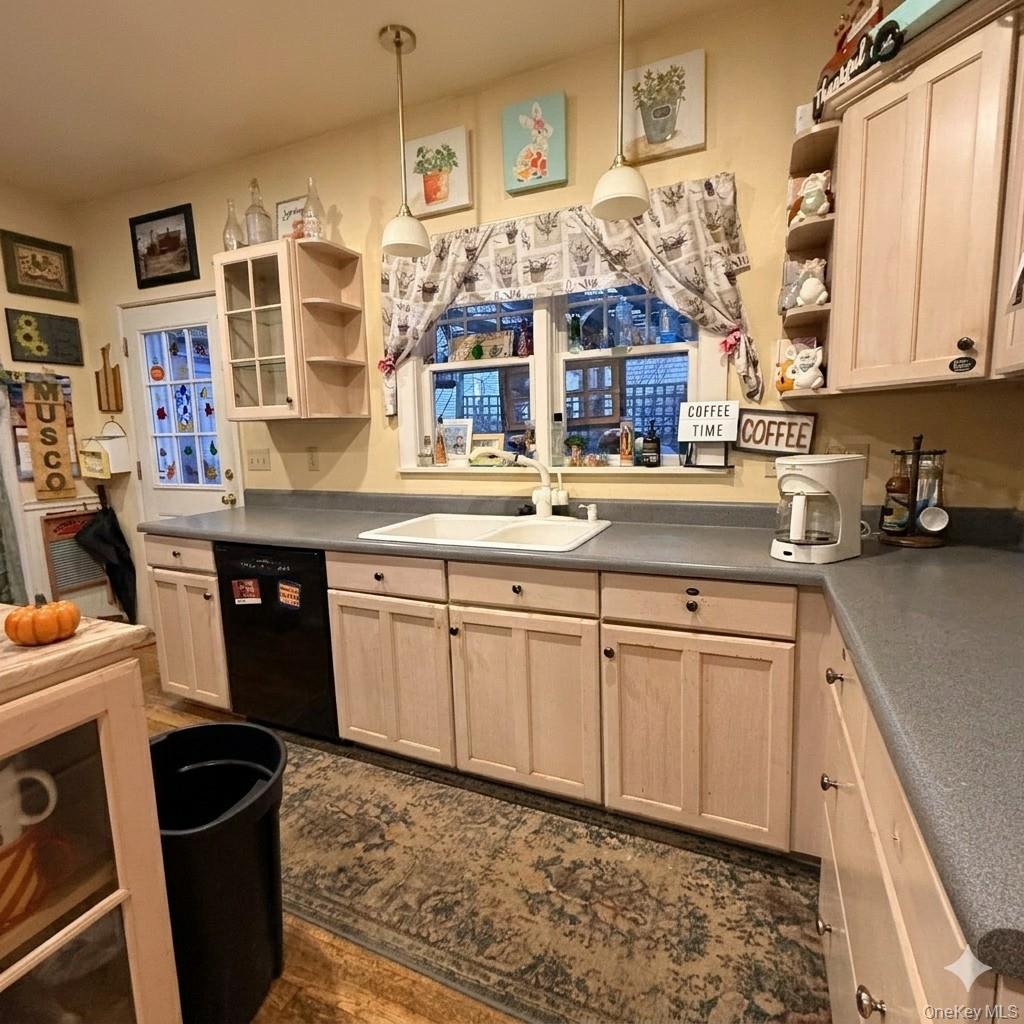 45 Maple Street Walden, NY 12586 - Photo 10 of 20 a kitchen with a sink and cabinets