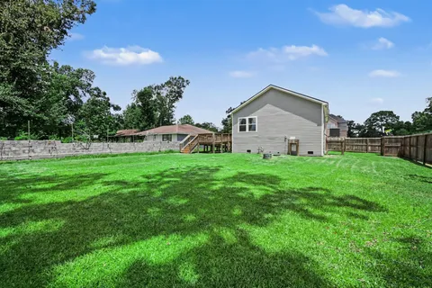 a front view of house with garden