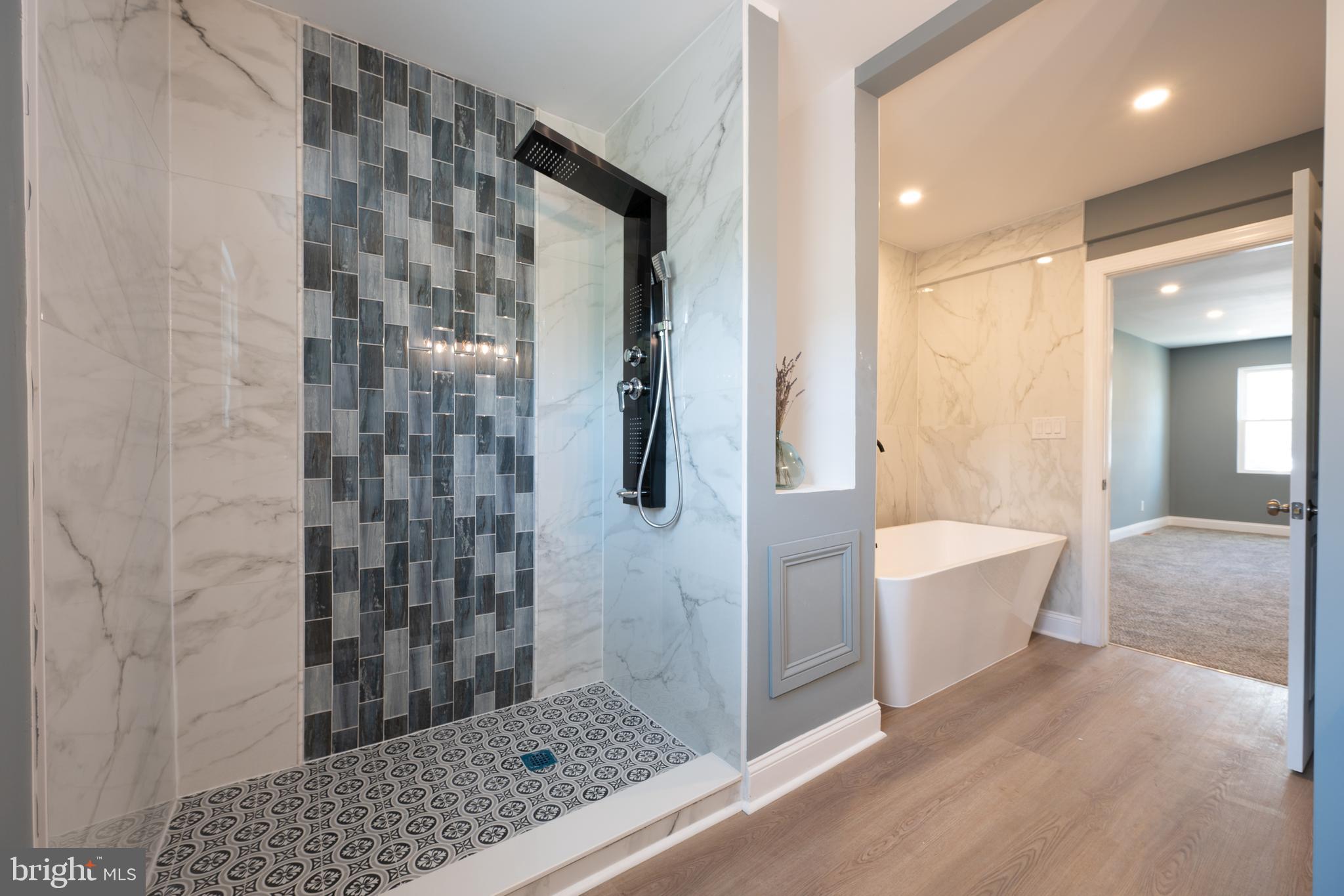 3 Slalom Court Pine Hill, NJ 08021 - Photo 24 of 47 a bathroom with a bathtub and shower