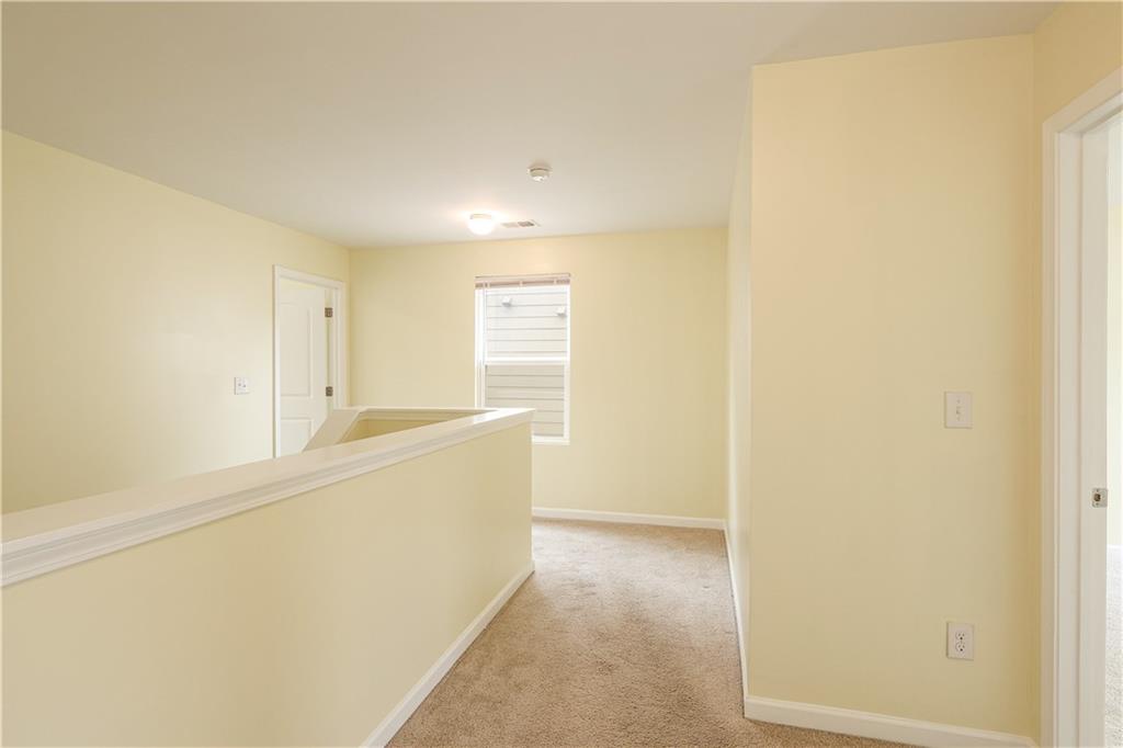 1562 Onalee Drive Hampton, GA 30228 - Photo 14 of 22 a view of an empty room with a window