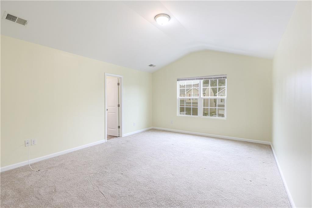 1562 Onalee Drive Hampton, GA 30228 - Photo 15 of 22 an empty room with windows