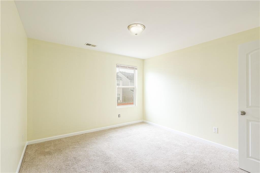 1562 Onalee Drive Hampton, GA 30228 - Photo 21 of 22 a view of an empty room