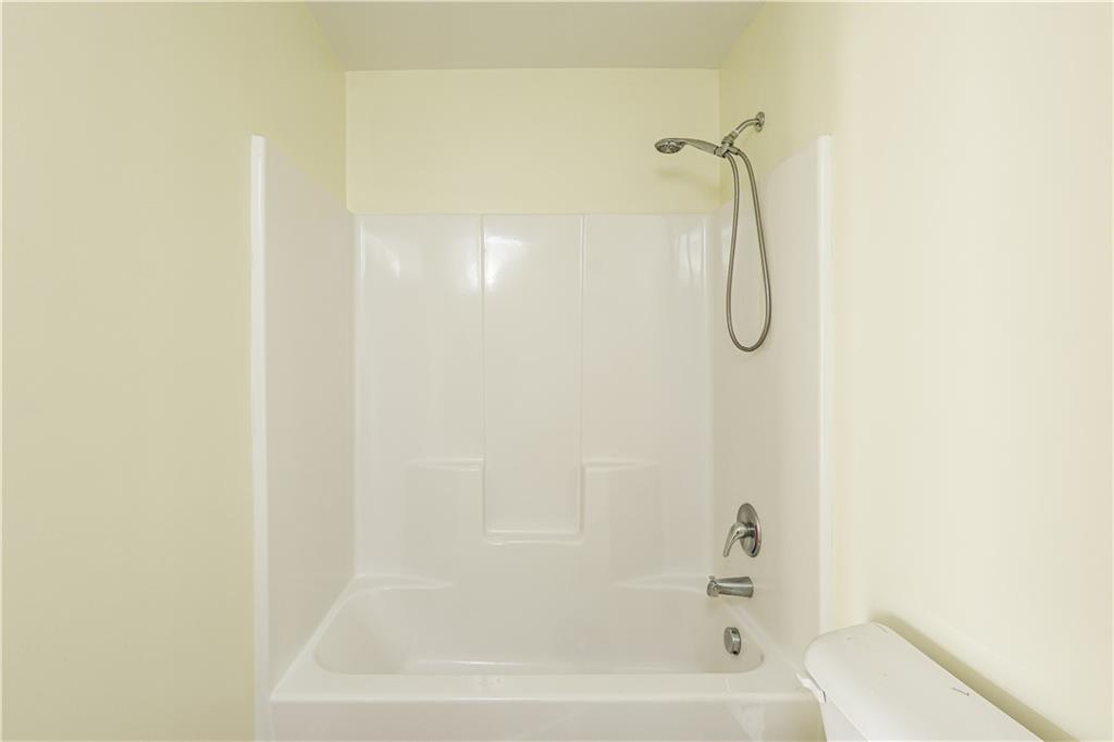 1562 Onalee Drive Hampton, GA 30228 - Photo 22 of 22 a bathroom with a shower