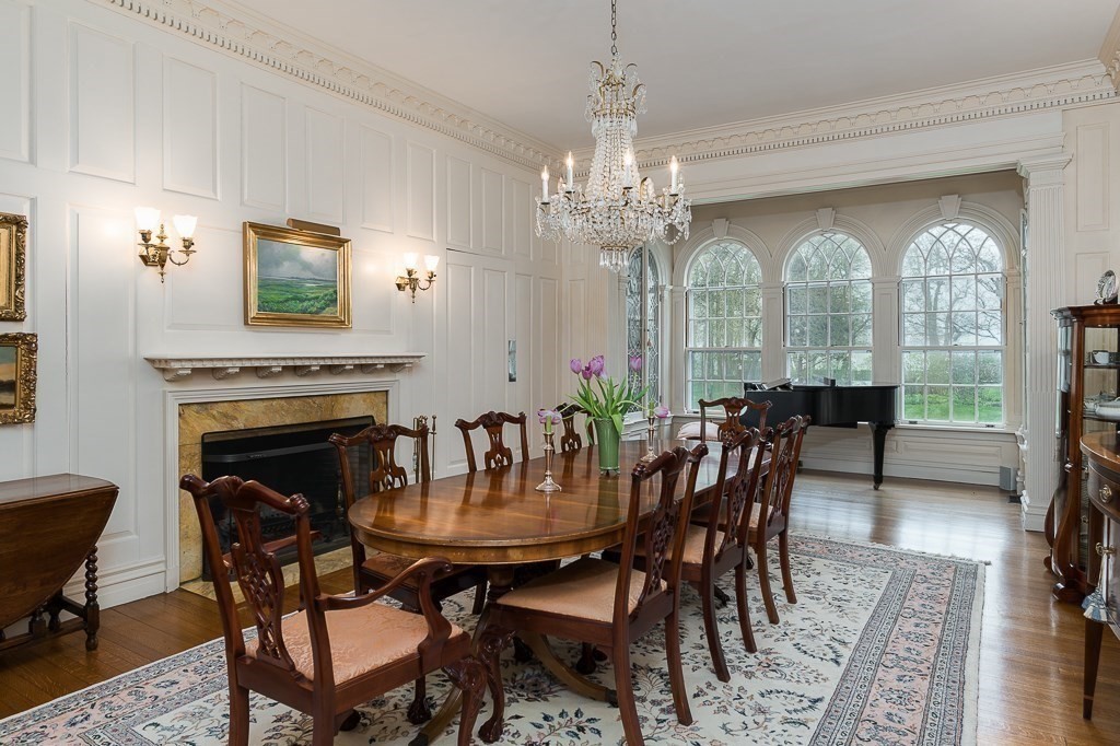 6 Jersey Lane Manchester, MA 01944 - Photo 13 of 42 a view of a dining room with furniture window and wooden floor