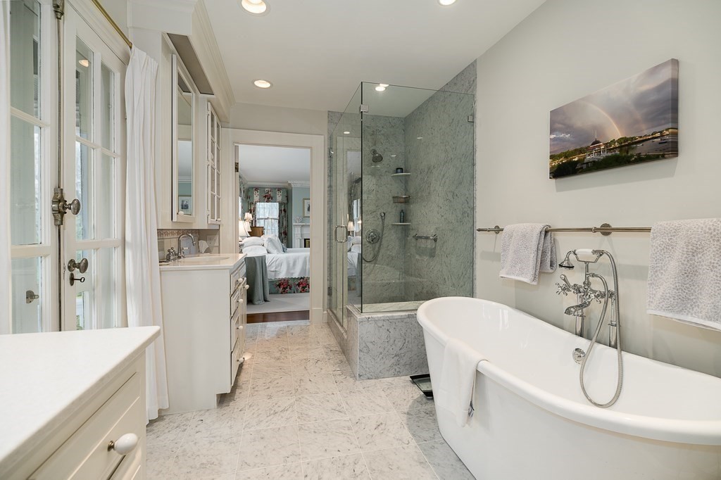 6 Jersey Lane Manchester, MA 01944 - Photo 26 of 42 a spacious bathroom with a bathtub and a sink