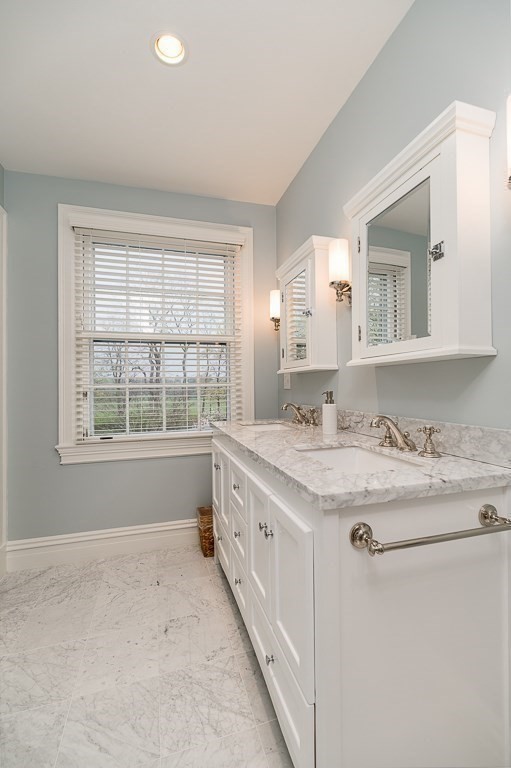 6 Jersey Lane Manchester, MA 01944 - Photo 30 of 42 a bathroom with a granite countertop sink and a window