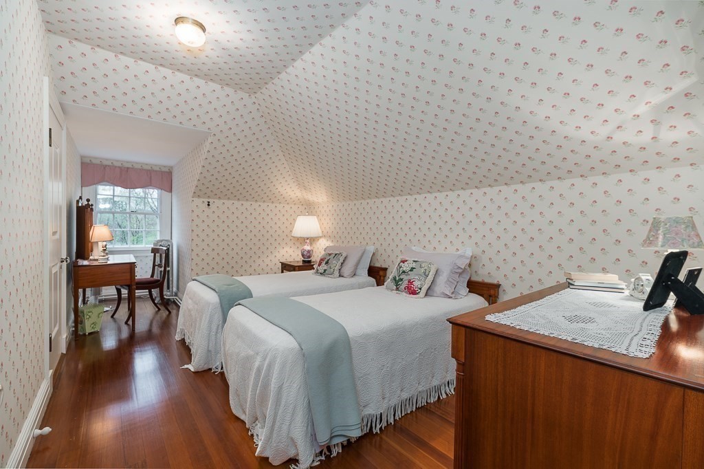 6 Jersey Lane Manchester, MA 01944 - Photo 33 of 42 a bedroom with a bed and a table