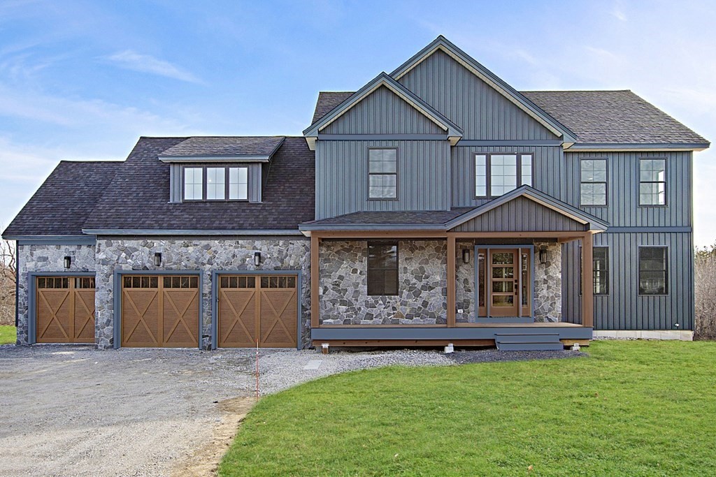 32 Lanes Road Westminster, MA 01473 - Photo 1 of 42 a front view of a house with a garden and yard