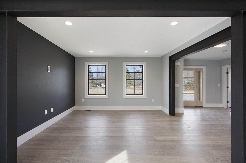 32 Lanes Road Westminster, MA 01473 - Photo 21 of 42 a view of an empty room with wooden floor and a window