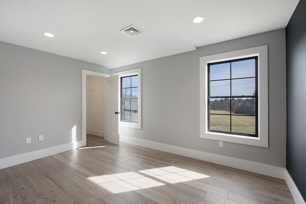 32 Lanes Road Westminster, MA 01473 - Photo 32 of 42 an empty room with windows and closet