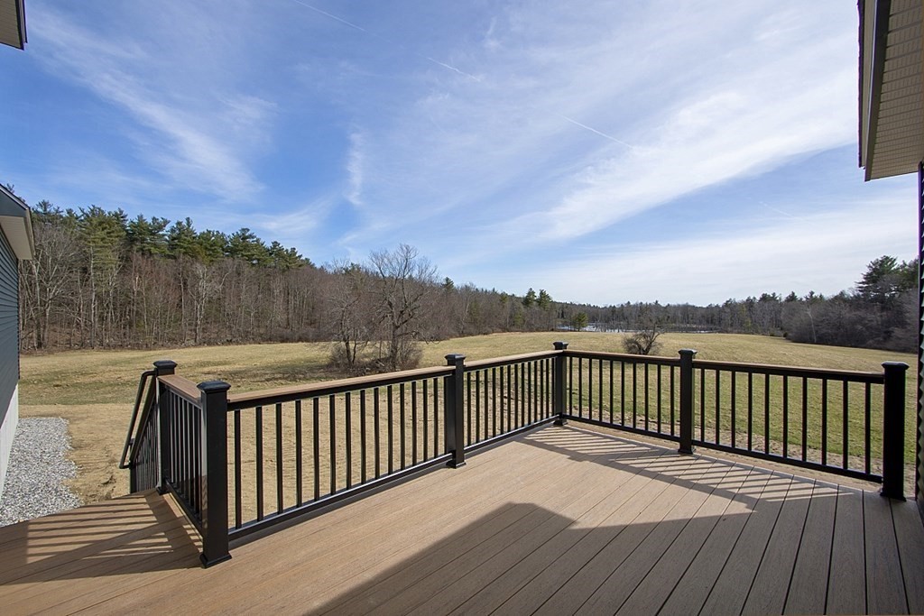 32 Lanes Road Westminster, MA 01473 - Photo 5 of 42 a balcony with wooden floor and fence