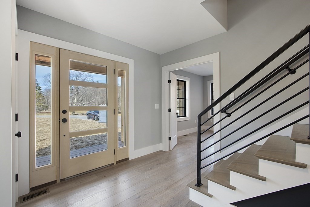 32 Lanes Road Westminster, MA 01473 - Photo 7 of 42 a view of a hallway with wooden floor and entryway