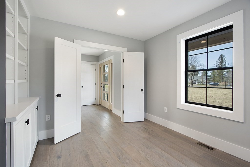 32 Lanes Road Westminster, MA 01473 - Photo 9 of 42 wooden floor in an empty room with a window