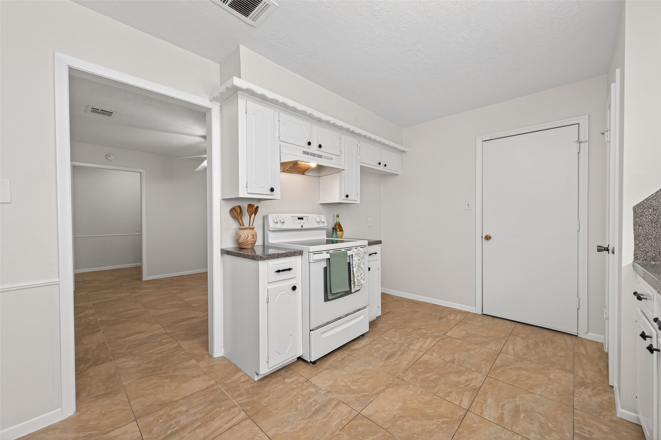 23919 Farm Hill Drive Spring, TX 77373 - Photo 18 of 41 a utility room with cabinets washer and dryer