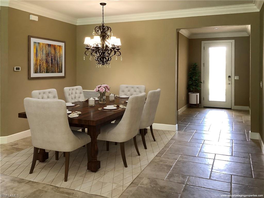10840 Rutherford Road Fort Myers, FL 33913 - Photo 3 of 35 Dining room with a notable chandelier and ornamental molding
