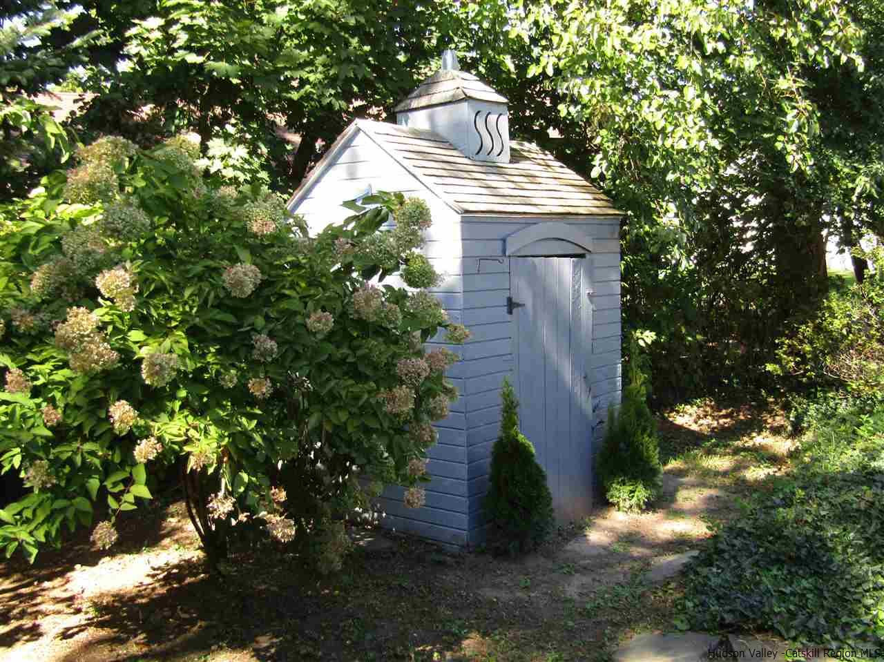 1023 Codwise Street Kingston, NY 12401 - Photo 15 of 17 a top view of a house with a yard and large trees
