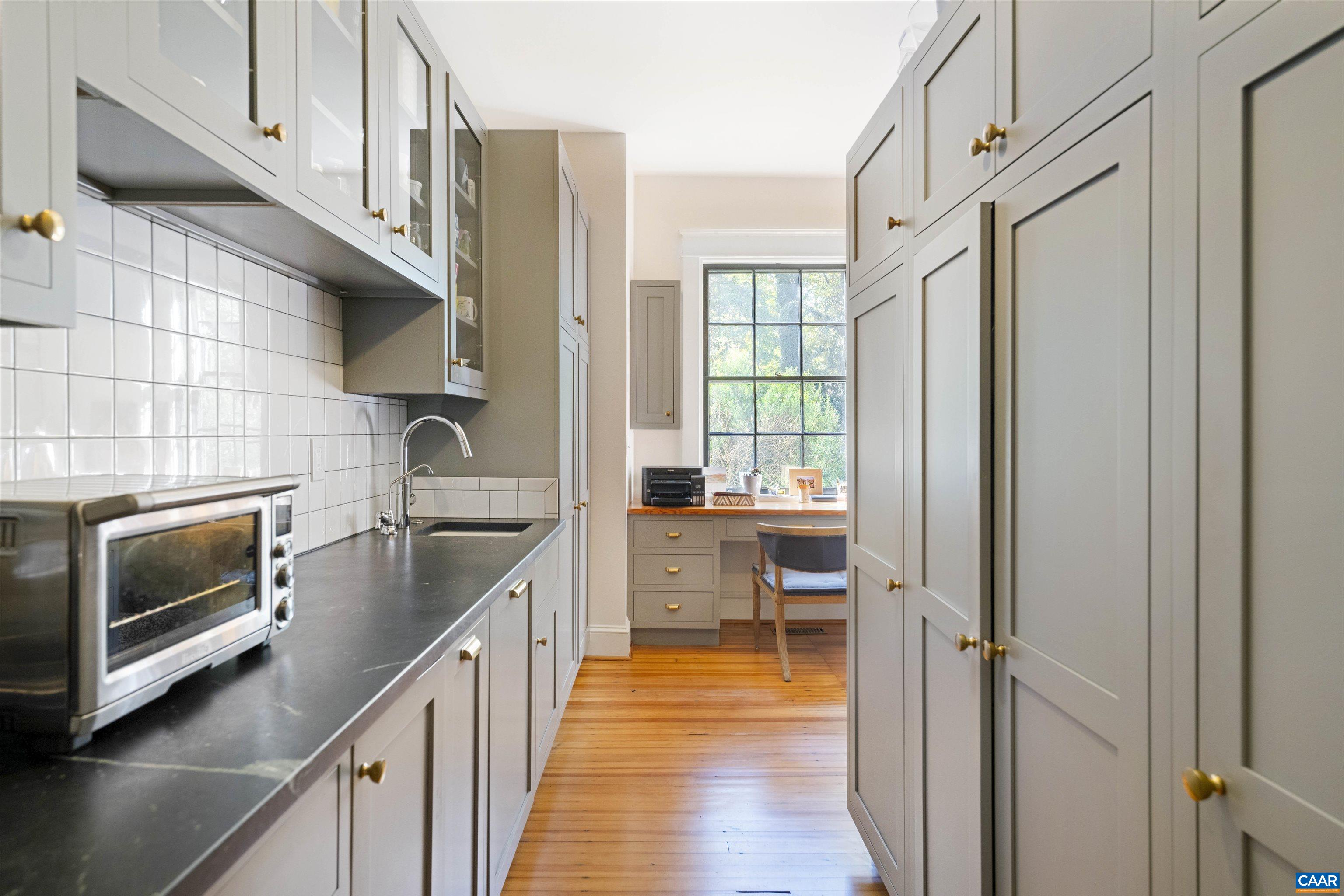 1535 Dairy Road Charlottesville, VA 22903 - Photo 11 of 70 a kitchen with stainless steel appliances a stove a sink and a refrigerator