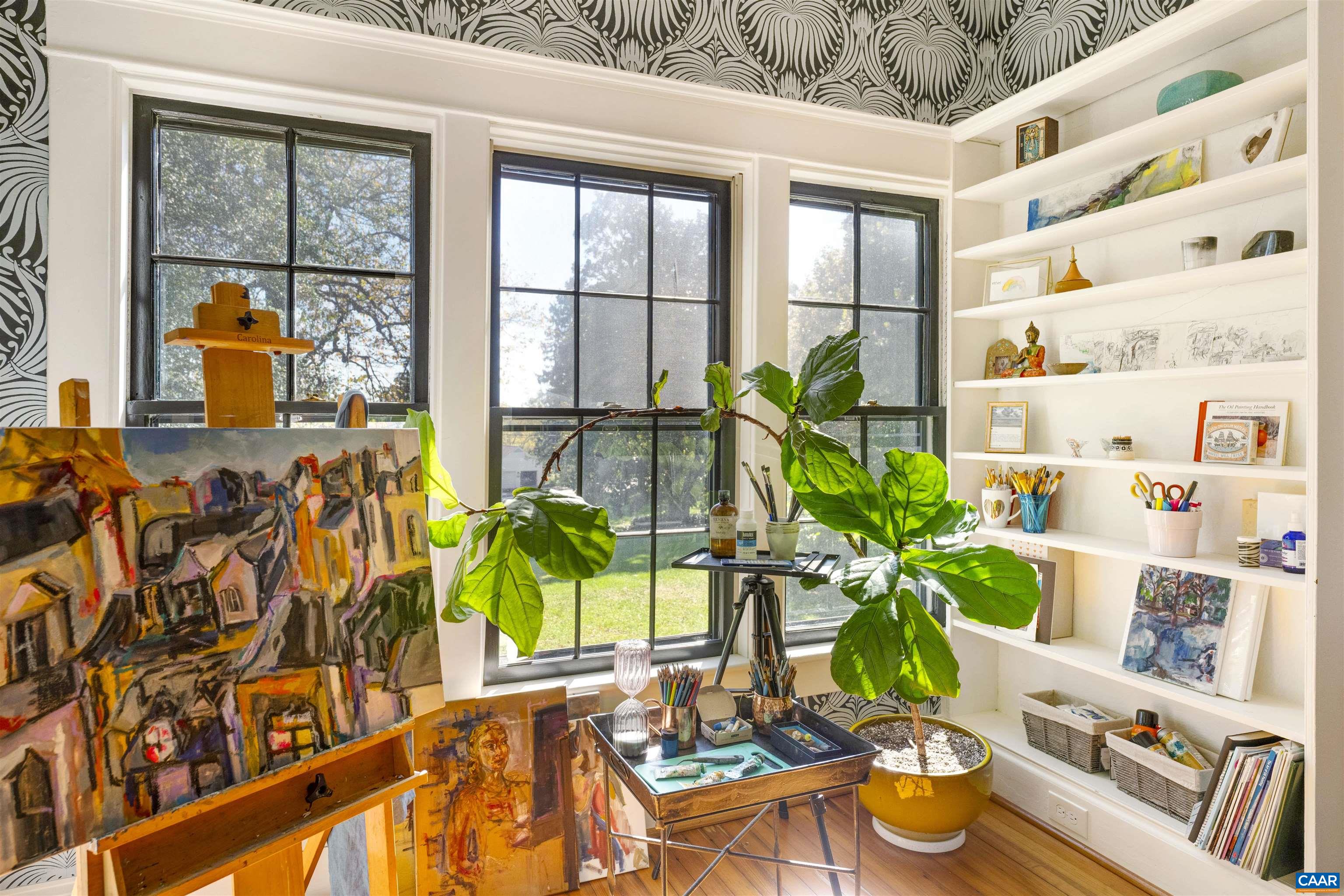 1535 Dairy Road Charlottesville, VA 22903 - Photo 17 of 70 a living room filled with furniture and a potted plant