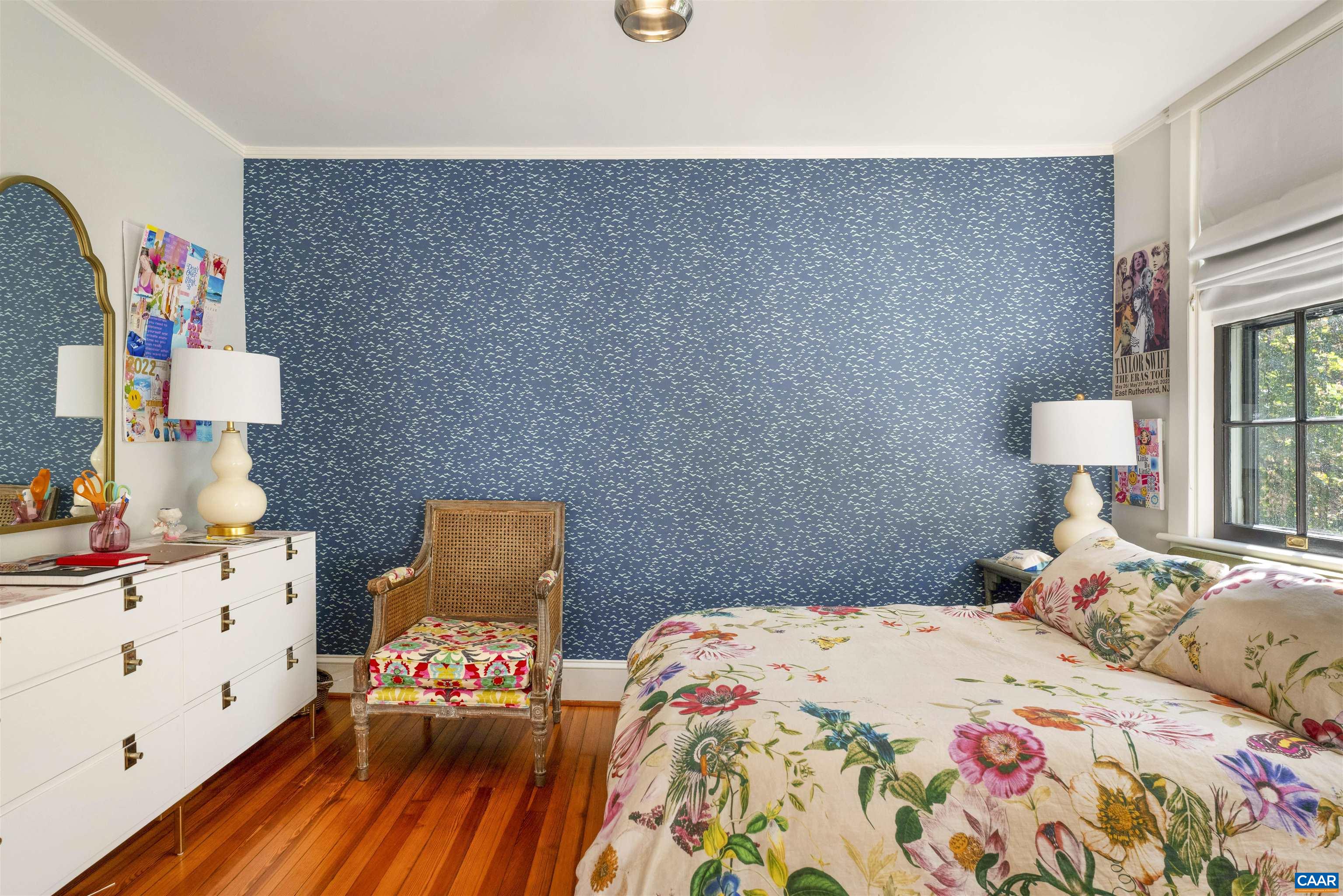 1535 Dairy Road Charlottesville, VA 22903 - Photo 31 of 70 a bedroom with a bed and wooden floor