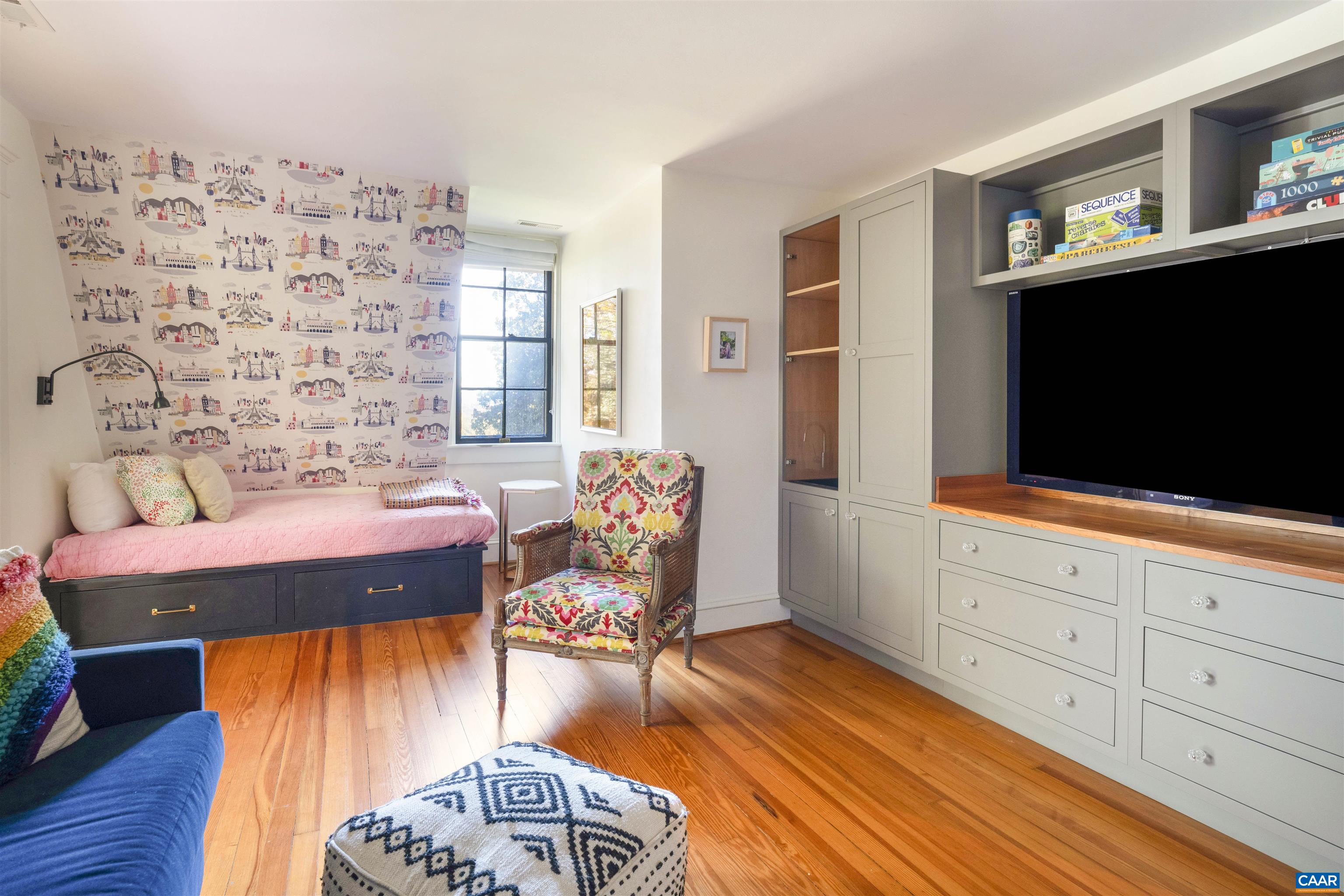 1535 Dairy Road Charlottesville, VA 22903 - Photo 36 of 70 a living room with furniture and a flat screen tv