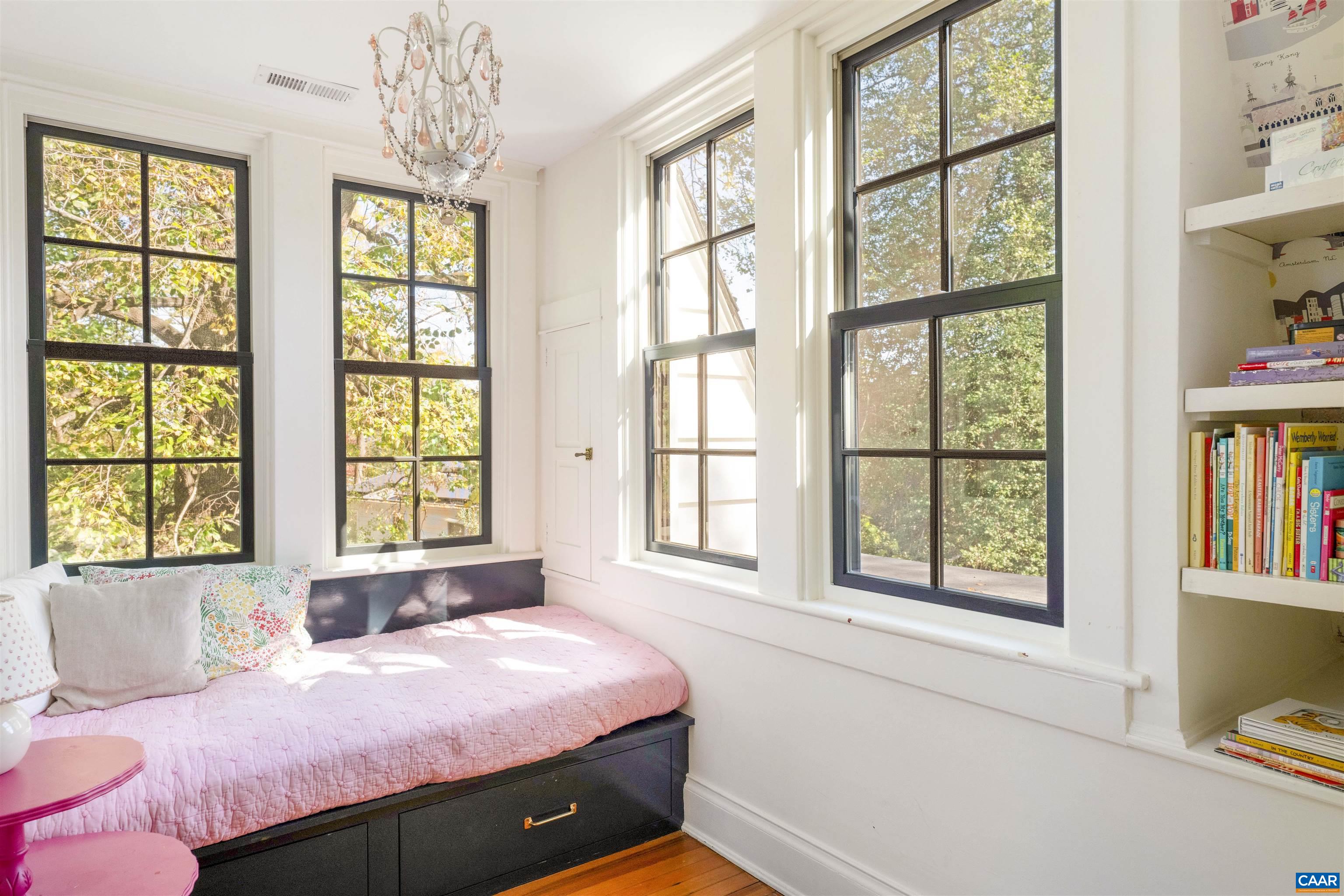 1535 Dairy Road Charlottesville, VA 22903 - Photo 37 of 70 a bedroom with a bed and a window with chair