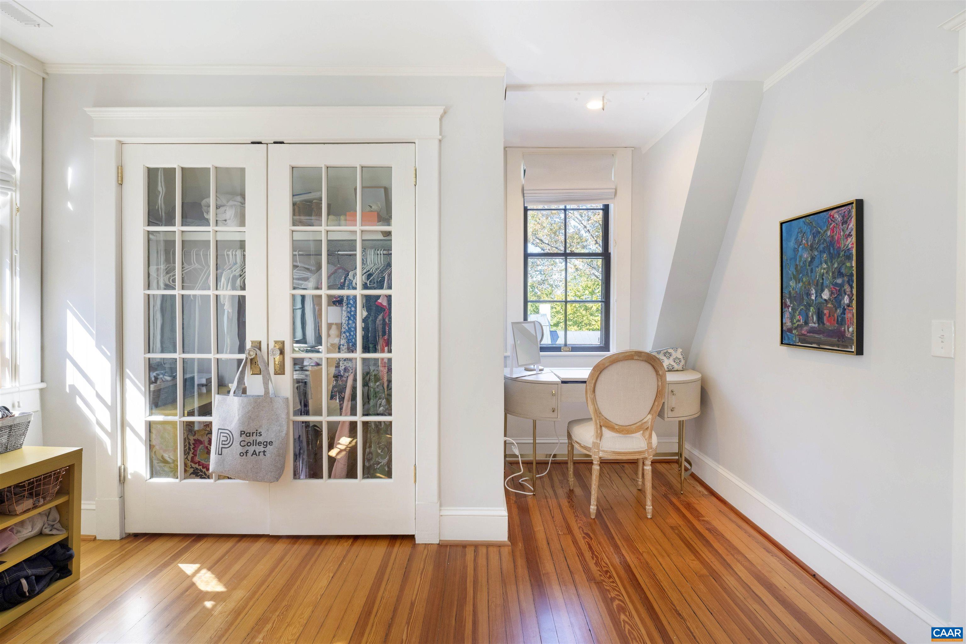 1535 Dairy Road Charlottesville, VA 22903 - Photo 39 of 70 a living room with furniture and a wooden floor