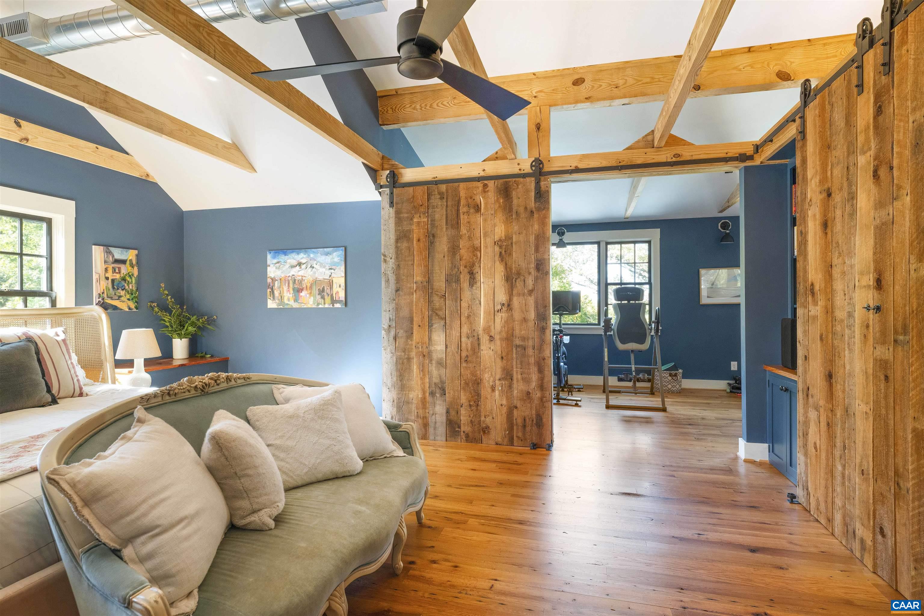 1535 Dairy Road Charlottesville, VA 22903 - Photo 42 of 70 a bedroom with furniture and wooden floor