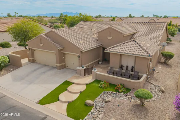 an aerial view of a house with garden