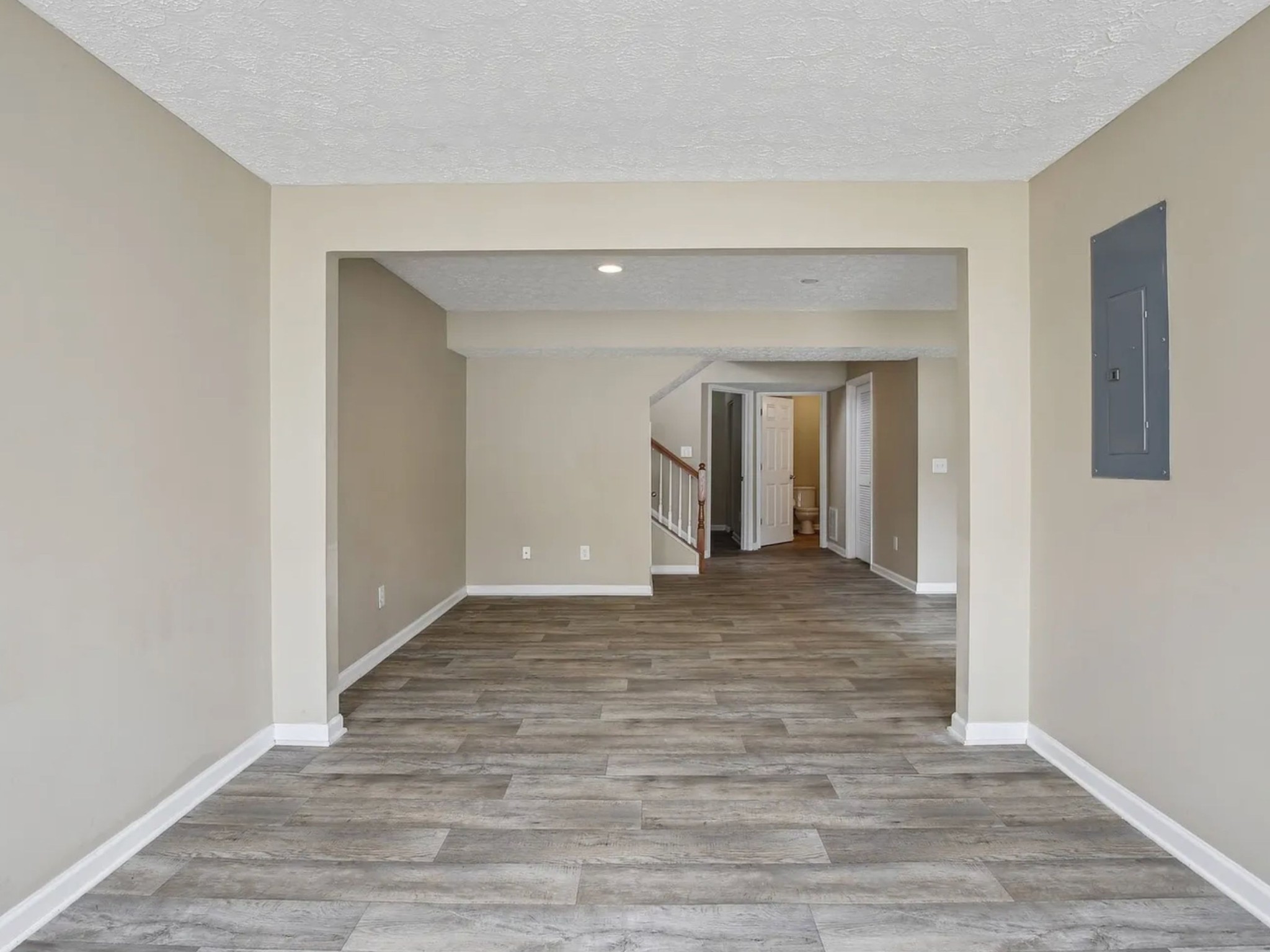 7841 Heaton Way Nashville, TN 37211 - Photo 16 of 25 a view of an empty room with wooden floor and a window