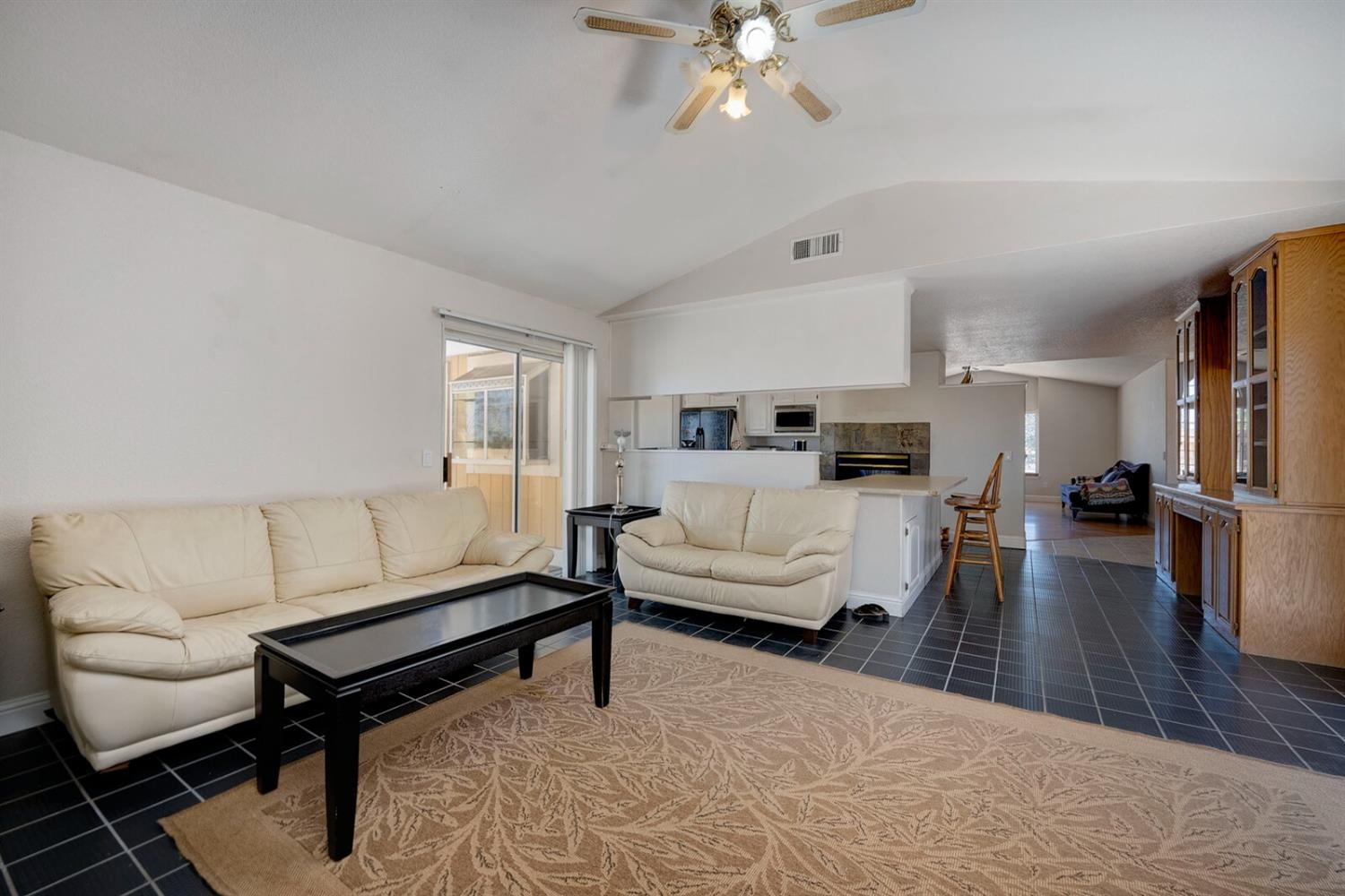 4427 East Catlett Road Lincoln, CA 95648 - Photo 18 of 51 a living room with furniture and a wooden floor