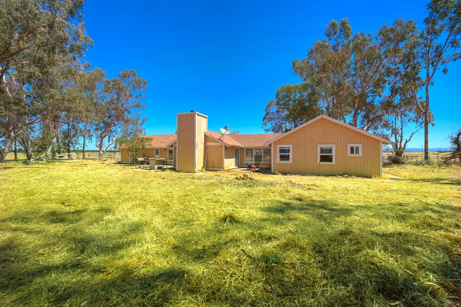 4427 East Catlett Road Lincoln, CA 95648 - Photo 37 of 51 a front view of a house with a yard