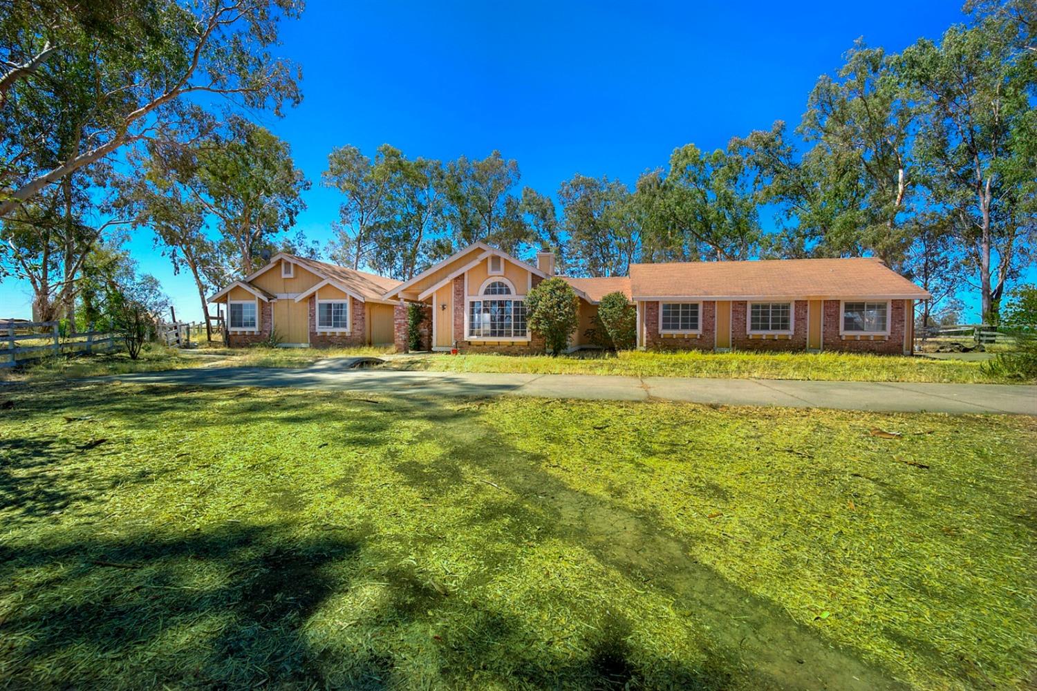 4427 East Catlett Road Lincoln, CA 95648 - Photo 10 of 51 a view of a house with a big yard