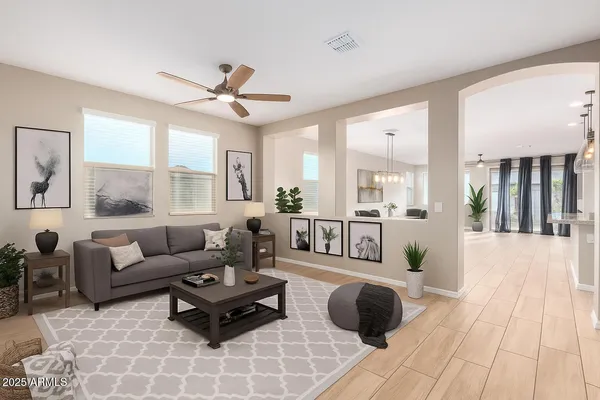 a living room with furniture and a large window